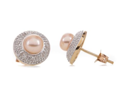 PAIR OF PEARL AND DIAMOND EARRINGS,set with spherical peachy pink pearls within an illusion set diamond chip halo, marked 375