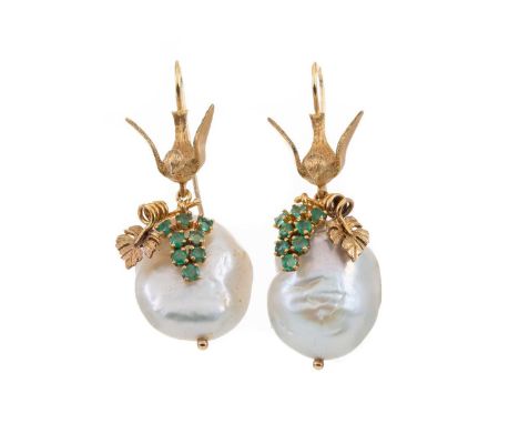 IMPRESSIVE PAIR OF PEARL AND EMERALD EARRINGS,the baroque pearls with overlaid leaf and emerald decoration, suspended from a 