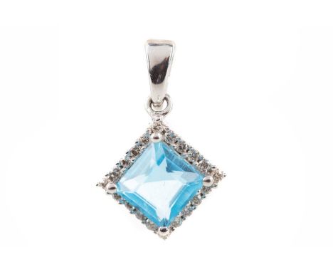 TOPAZ AND DIAMOND PENDANT,set with a step cut blue topaz within a diamond halo, marked 9K, 1.7g