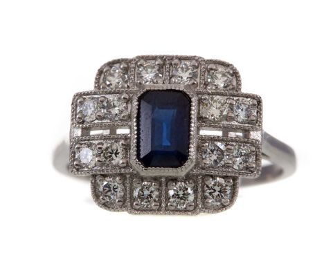 SAPPHIRE AND DIAMOND RING,set with a central step cut sapphire to a diamond plaque, the round brilliant cut diamonds totallin