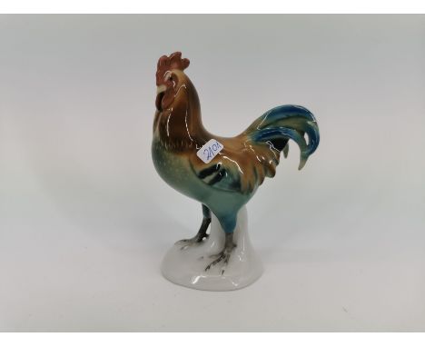 PORZELLANFIGUR "Hahn", 1930er Jahre, Porzellan, polychrom staffiert. Unter dem Stand mit Manufaktur-Pressmarke, unterglasurbl