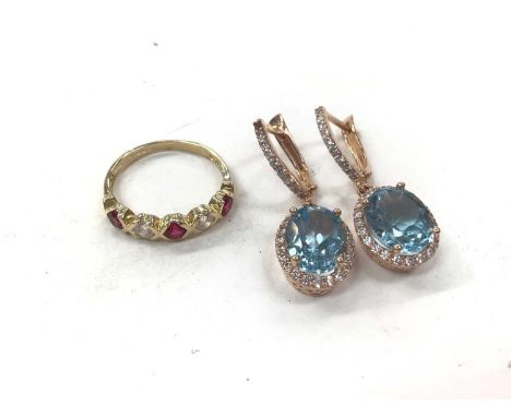 Pair of 14ct rose gold gem set earrings and 14ct gold gem set half eternity ring, size KTotal weight 7.1 grams