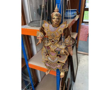 Asian carved gilt wood puppet with embroidered clothing