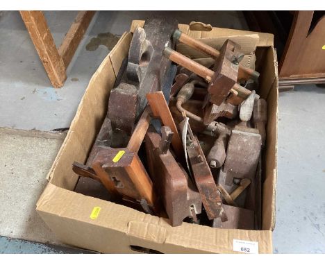 Collection of vintage woodworking tools and magazine rack