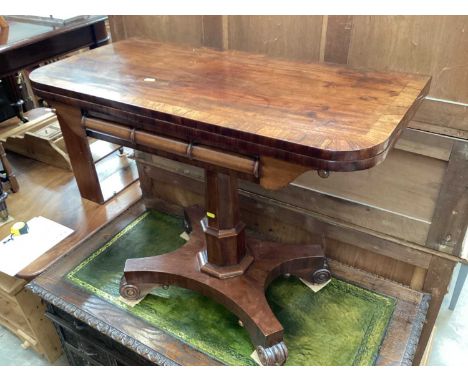 19th century mahogany card table with foldover revolving top on faceted column on quatrefoil base with four scroll feet, 91.5