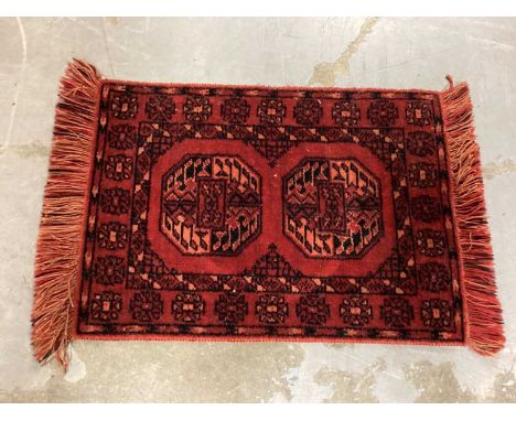 Small eastern prayer mat, 30cm x 22cm, together with a wicker basket, wicker two tier table and a treen bowl (4)