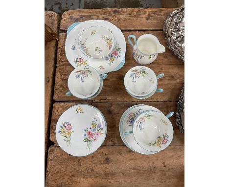 Shelley ‘Wild Flowers’ pattern tea service, including six cups, saucers and side plates, milk jug, sugar bowl and cake plate