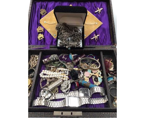 Jewellery box containing vintage and later costume jewellery, African white metal necklace, pendants etc, various wristwatche