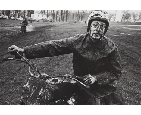 Danny Lyon (American, b. 1942). Gelatin silver print photograph titled "Racer, Schererville, Indiana" depicting a figure spla