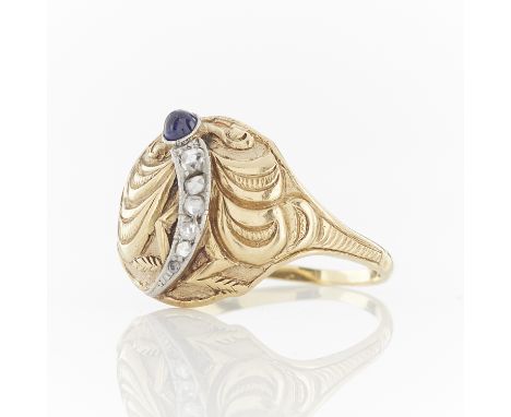 Cozzolino, Italian, Uruguayan. 14k yellow and white gold domed ring ornately carved with a dragon fly design, ca. 1930s. The 