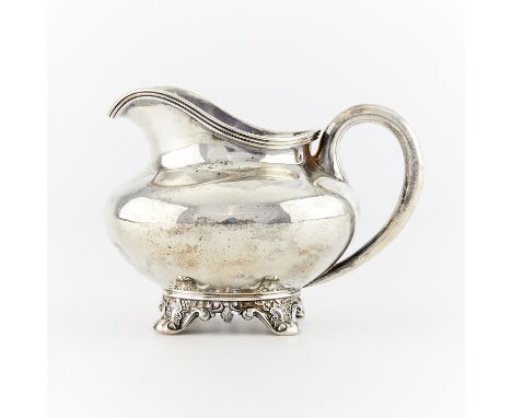 Bigelow, Kennard &amp; Co., Boston, Massachusetts. Sterling silver footed pitcher. With a gently sloping rim and squat form. 
