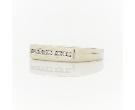 14k white gold ring, channel set with nine single cut diamonds. Unmarked, tested 14k.Ring size: 5 US. Gross weight: 4.6 grams