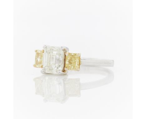 Oscar Friedman 18k white and yellow gold and diamond ring. Set with a central step cut diamond 1.50 carat, K color, I1 clarit