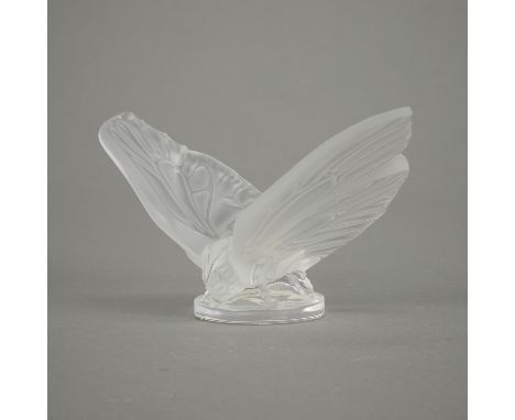 Lalique, France. Frosted crystal glass butterfly. Signed along the side. With the original tag affixed to the underside and o