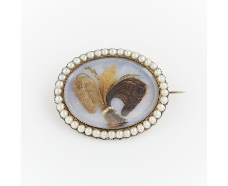 Georgian hairwork brooch, housed in a gold scalloped frame with 40 pearls around beveled glass over an iridescent shell backi