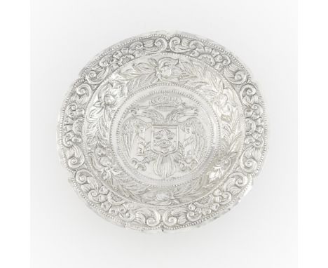 Peruvian colonial silver bowl with repousse decoration. The base depicts the Lima coat of arms of the crowned double headed e