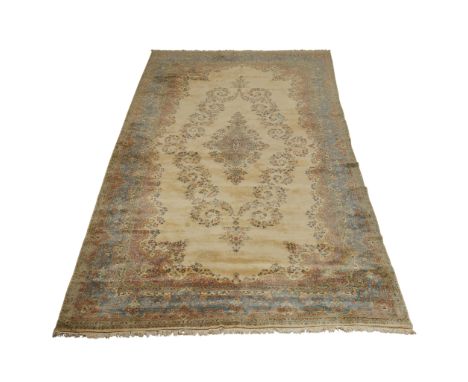 Very large palace size Persian Kerman rug. The hand-woven carpet with bands of pale green, pink, and light blue floral border