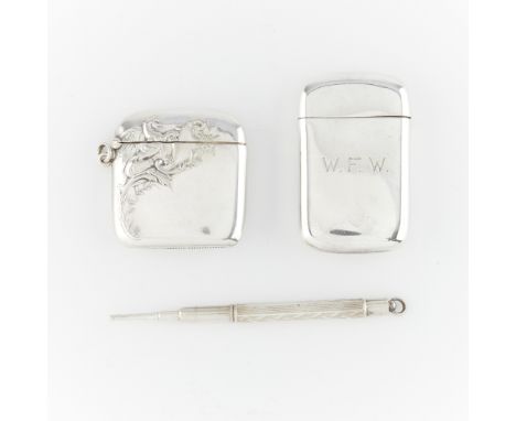 Two vesta cases and a sterling silver pencil.One vesta case with plain exterior, engraved W.F.W. Gilt wash interior marked st