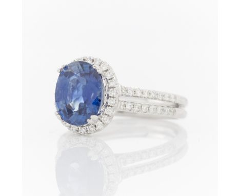 18k white gold double banded ring with halo setting, pave set with a total of 54 brilliant cut diamonds, 0.37 carat total wei