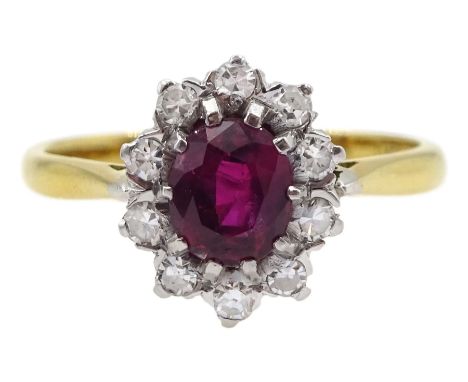 Gold oval ruby and diamond cluster ring, stamped 18ct Plat, ruby approx 0.70 carat