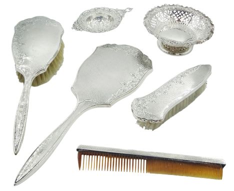 Mid 20th century four piece silver mounted dressing table set, comprising hand held mirror, hairbrush, clothes brush and comb