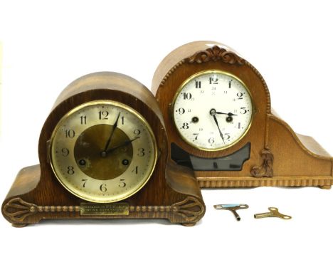 Early 20th century German oak cased 24 hour mantel clock with glazed pendulum display panel, with a further oak cased mantel 