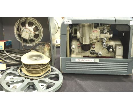 GB Bell and Howell film projector separate speaker together with reels etc. Not available for in-house P&amp;P, contact Paul 