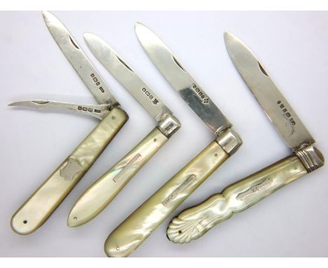 Four hallmarked silver blade mother of pearl handle fruit knives, mixed makers, including a twin blade example. P&amp;P Group