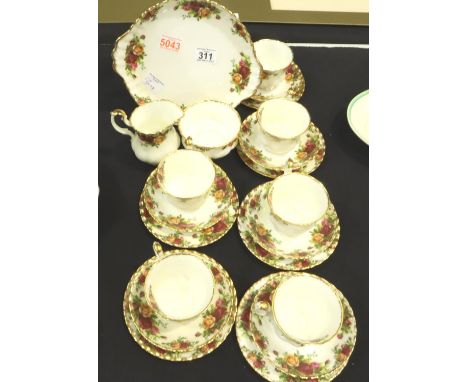 Royal Albert twenty-one piece tea service in the Old Country Roses pattern (21). P&amp;P for this lot is £40+VAT 