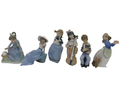 Six Nao porcelain figures, modelled as a girl playing a cello, 20cm high, a boy holding a puppy, a girl holding a puppy, a gi