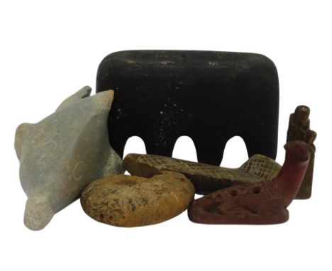 A group of carvings, to include a black painted sculpture in the manner of Henry Moore, 13cm high, carving of a fish, fossili