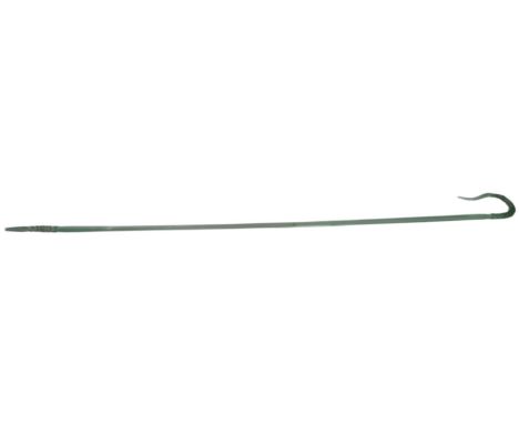 A Nailsea type green glass walking cane, with twisted handle and end, 132cm high. (AF)