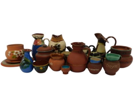 A group of Torquay ware, to include motto ware, terracotta Torquay wares, a tobacco jar and cover, various jugs, batchelors t