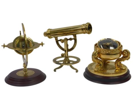 A Franklin Mint The Discovery of America commemorative compass, on a stepped wooden base, 20cm high, together with a maritime