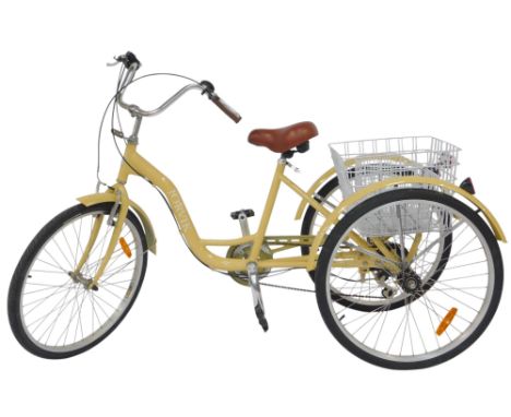 A Jorvik tricycle, in buttermilk yellow trim, with a brown leather seat, wirework front basket and rear basket.