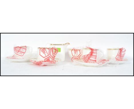 A Royal Doulton part tea service in the Concord pattern No H5049 comprising cups, saucers creamer, sugar bowl etc