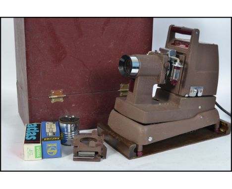 A vintage mid century Kershaw Strip projector complete with bulbs and in the original portable carry case