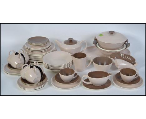 An extensive collection of retro / 1970's Poole pottery dinner service to include cups, saucers, plates etc all with stamps t