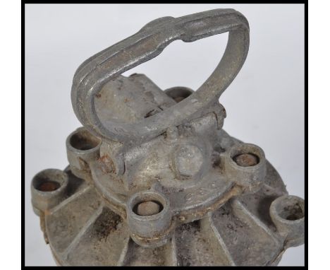 A stunning 20th century G E C bulk head / inspection lamp, having a cast metal carry handle atop and the glass cage having a 