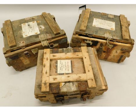 Three crates, used for storing ordnance, with original labels etc.