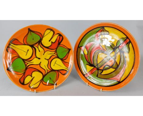 Two similar Poole Pottery Delphis range plates, decorated in green, orange, red and yellow, 25cm diameter