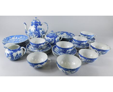 A Japanese egg shell porcelain part tea service, printed in blue with a version of the Prunus pattern