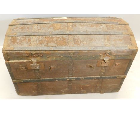 A canvas and metal bound dome top trunk, with side handles (AF), 100cm wide