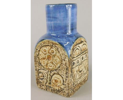 A Troika Newlyn spice jar, on a blue ground, decorator's initials for Avril Bennett, 15cm high