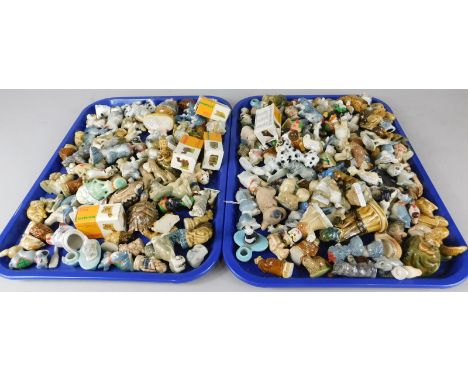 A large quantity of Wade whimsies, to include some Disney characters etc. (2 trays)
