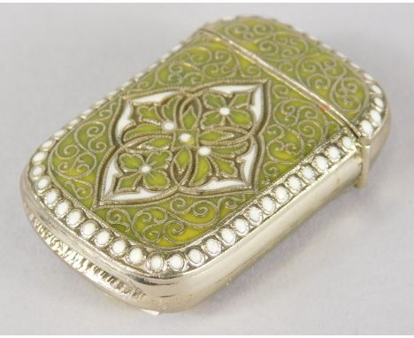 A David Anderson vesta case, with green and white enamel decoration, 4.5cm high. 
