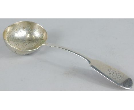 A late 19thC Russian fiddle pattern ladle, marks for St Petersburg 1885, possibly late converted to a strainer or sifting spo