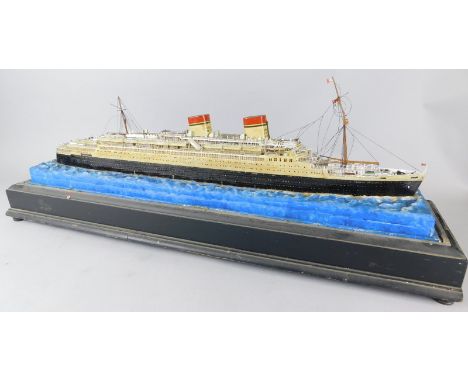 An elaborate scale model of a two funnelled cruise ship, from the Italia Line, on ebonised base with glazed cover (AF), 75cm 