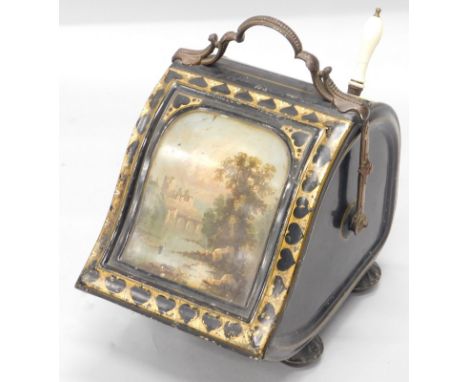 A Victorian toleware coal scuttle, the hinged lid decorated with a Continental river landscape, the remainder in a black grou