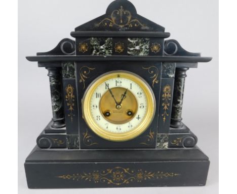 A late 19thC French black slate and marble portico type mantel clock, the dial stamped Emanuel Southampton, 31cm wide